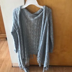 A Gray cardigan sweater